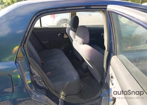 2009 Nissan Versa 1.6 Base z USA, uszkodzony, nr VIN 3N1CC11E19L458511